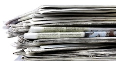 stack-of-newspapers